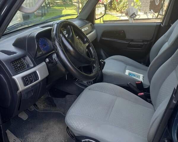 Зелений Міцубісі Паджеро, об'ємом двигуна 1.8 л та пробігом 205 тис. км за 5800 $, фото 8 на Automoto.ua