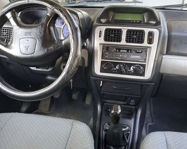 Зелений Міцубісі Паджеро, об'ємом двигуна 1.8 л та пробігом 205 тис. км за 5800 $, фото 20 на Automoto.ua