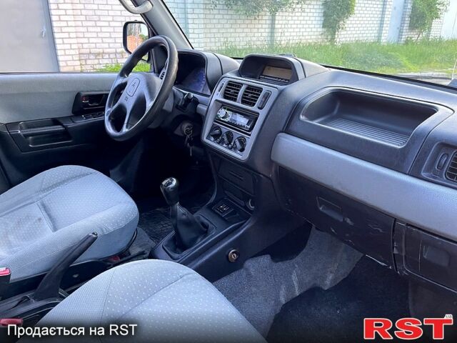 Зеленый Мицубиси Паджеро, объемом двигателя 1.8 л и пробегом 310 тыс. км за 5500 $, фото 7 на Automoto.ua