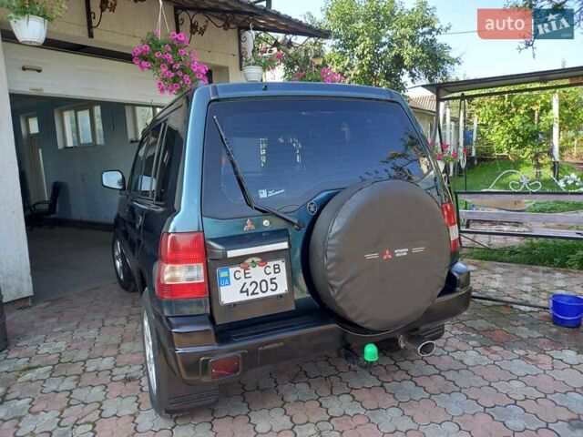 Зелений Міцубісі Паджеро, об'ємом двигуна 1.8 л та пробігом 205 тис. км за 5800 $, фото 25 на Automoto.ua