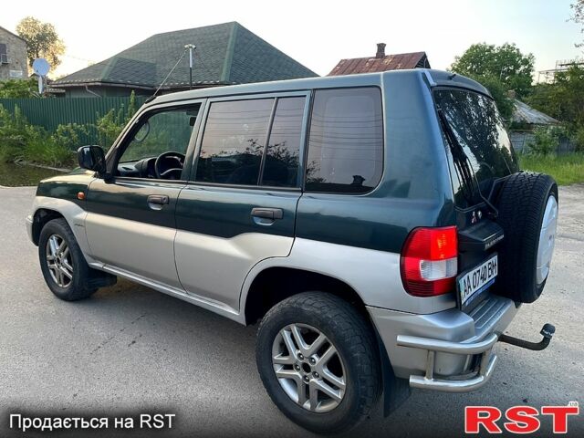Зеленый Мицубиси Паджеро, объемом двигателя 1.8 л и пробегом 310 тыс. км за 5500 $, фото 5 на Automoto.ua