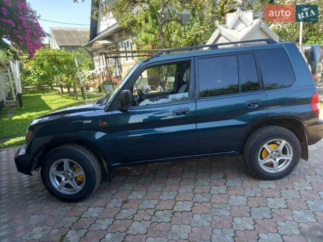 Зелений Міцубісі Паджеро, об'ємом двигуна 1.8 л та пробігом 205 тис. км за 5800 $, фото 5 на Automoto.ua