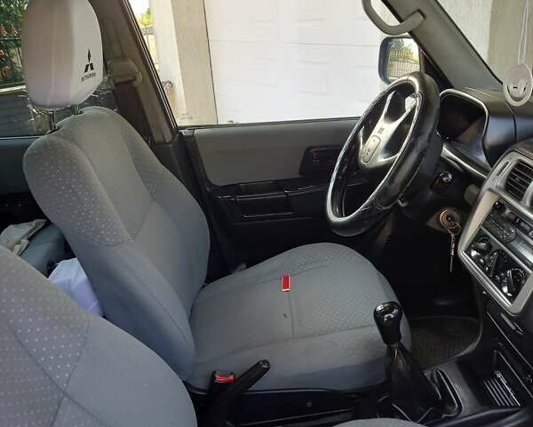 Зелений Міцубісі Паджеро, об'ємом двигуна 1.8 л та пробігом 205 тис. км за 5800 $, фото 18 на Automoto.ua