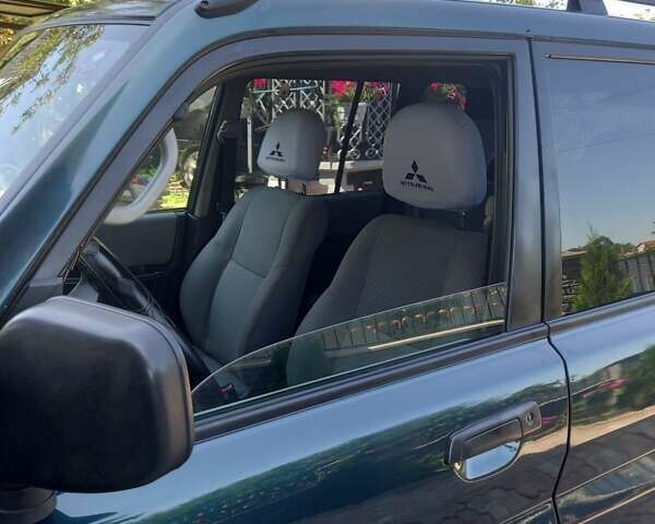 Зелений Міцубісі Паджеро, об'ємом двигуна 1.8 л та пробігом 205 тис. км за 5800 $, фото 4 на Automoto.ua