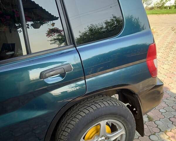 Зелений Міцубісі Паджеро, об'ємом двигуна 1.8 л та пробігом 205 тис. км за 5800 $, фото 15 на Automoto.ua