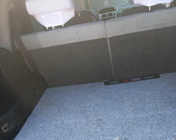 Зелений Міцубісі Паджеро, об'ємом двигуна 1.8 л та пробігом 205 тис. км за 5800 $, фото 10 на Automoto.ua