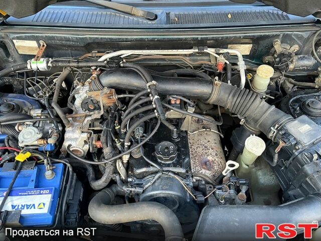 Зеленый Мицубиси Паджеро, объемом двигателя 1.8 л и пробегом 310 тыс. км за 5500 $, фото 10 на Automoto.ua