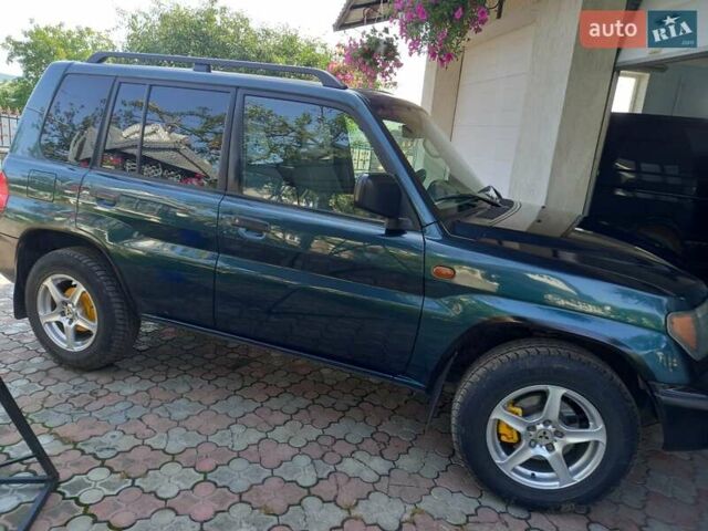Зелений Міцубісі Паджеро, об'ємом двигуна 1.8 л та пробігом 205 тис. км за 5800 $, фото 14 на Automoto.ua