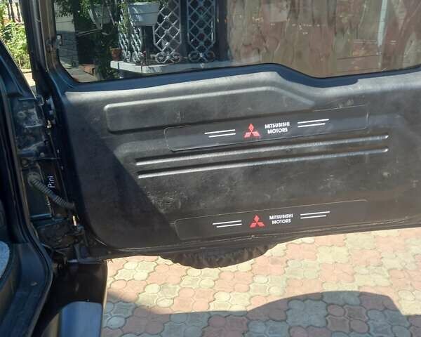 Зелений Міцубісі Паджеро, об'ємом двигуна 1.8 л та пробігом 205 тис. км за 5800 $, фото 9 на Automoto.ua