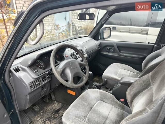 Зеленый Мицубиси Паджеро, объемом двигателя 2.5 л и пробегом 180 тыс. км за 6499 $, фото 2 на Automoto.ua