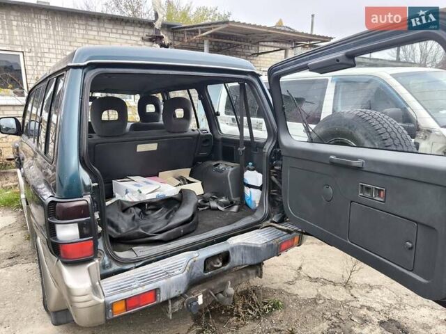 Зеленый Мицубиси Паджеро, объемом двигателя 2.5 л и пробегом 180 тыс. км за 6499 $, фото 11 на Automoto.ua