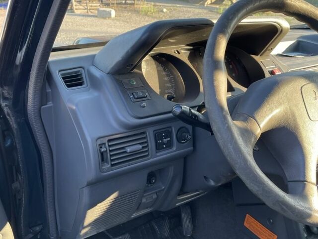 Зеленый Мицубиси Паджеро, объемом двигателя 2.5 л и пробегом 173 тыс. км за 5966 $, фото 3 на Automoto.ua