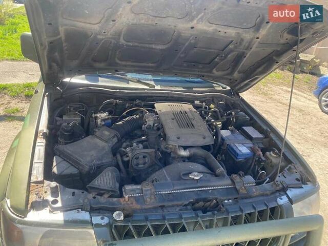 Зеленый Мицубиси Паджеро, объемом двигателя 3 л и пробегом 392 тыс. км за 7700 $, фото 12 на Automoto.ua