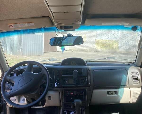 Зеленый Мицубиси Паджеро, объемом двигателя 3 л и пробегом 392 тыс. км за 7700 $, фото 6 на Automoto.ua