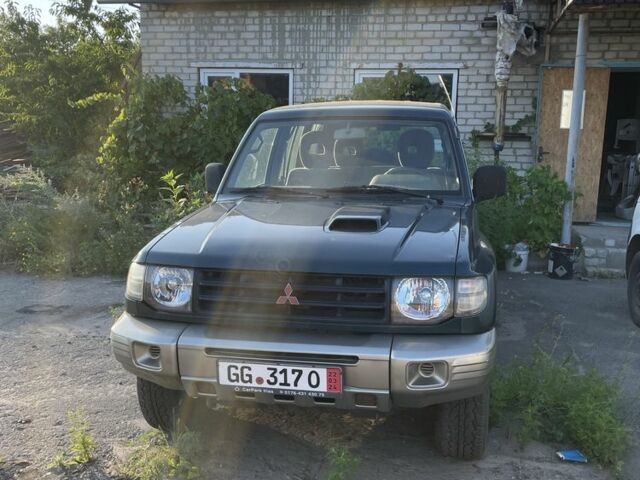 Зеленый Мицубиси Паджеро, объемом двигателя 2.5 л и пробегом 173 тыс. км за 5966 $, фото 1 на Automoto.ua