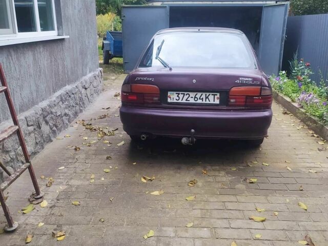 Красный Мицубиси Протон, объемом двигателя 1.3 л и пробегом 290 тыс. км за 1200 $, фото 1 на Automoto.ua