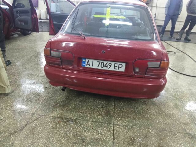 Красный Мицубиси Протон, объемом двигателя 1.5 л и пробегом 200 тыс. км за 1351 $, фото 3 на Automoto.ua