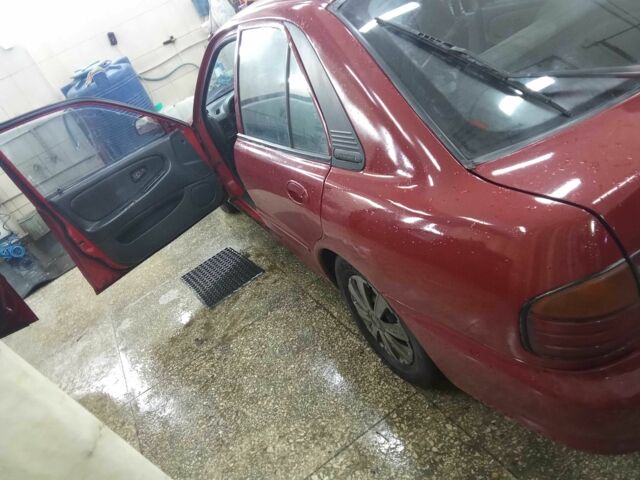 Красный Мицубиси Протон, объемом двигателя 1.5 л и пробегом 200 тыс. км за 1351 $, фото 2 на Automoto.ua