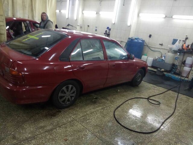 Красный Мицубиси Протон, объемом двигателя 1.5 л и пробегом 200 тыс. км за 1351 $, фото 4 на Automoto.ua