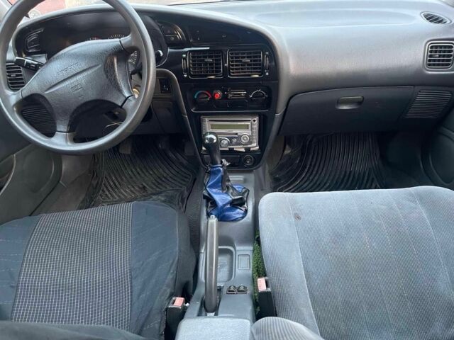 Серый Мицубиси Протон, объемом двигателя 1.5 л и пробегом 154 тыс. км за 1150 $, фото 4 на Automoto.ua