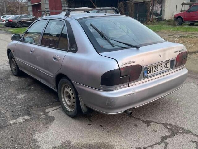 Серый Мицубиси Протон, объемом двигателя 1.5 л и пробегом 154 тыс. км за 1150 $, фото 3 на Automoto.ua