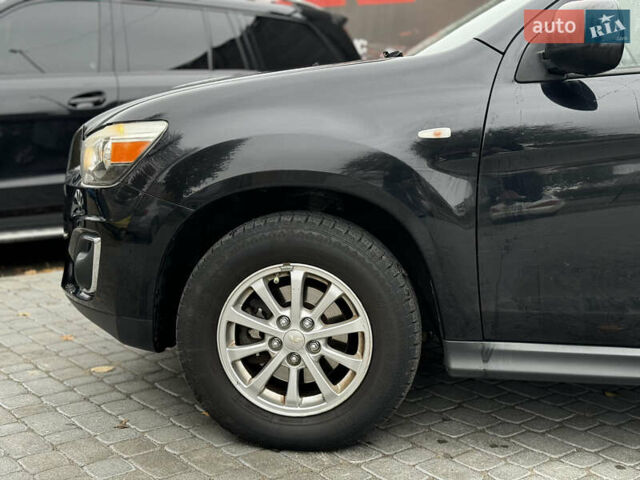 Мицубиси РВР 2012 в Виннице на Automoto.ua Черный Мицубиси РВР, объемом двигателя 2 л и пробегом 195 тыс. км за 7800 $, фото 7 на Automoto.ua