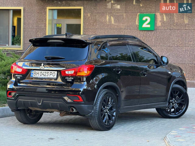 Черный Мицубиси РВР, объемом двигателя 2.36 л и пробегом 130 тыс. км за 13900 $, фото 13 на Automoto.ua