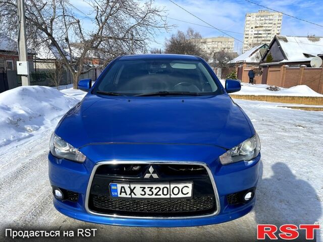 Синий Мицубиси Раллиарт, объемом двигателя 2 л и пробегом 19800 тыс. км за 10000 $, фото 2 на Automoto.ua