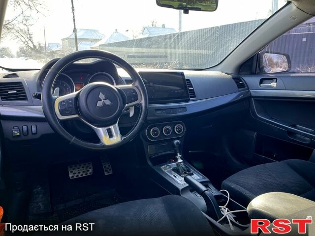 Синий Мицубиси Раллиарт, объемом двигателя 2 л и пробегом 19800 тыс. км за 10000 $, фото 7 на Automoto.ua