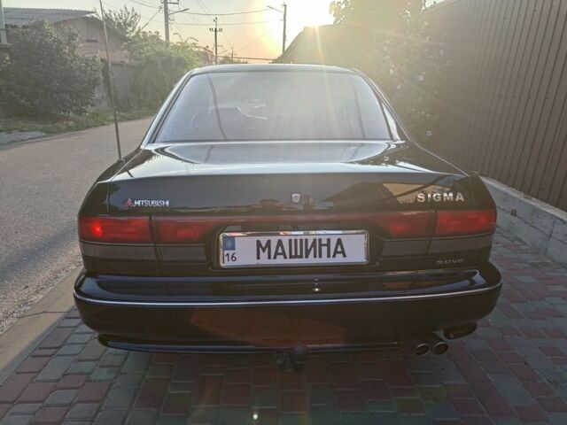 Черный Мицубиси Сигма, объемом двигателя 3 л и пробегом 250 тыс. км за 3452 $, фото 2 на Automoto.ua