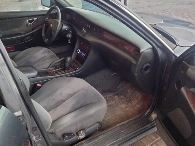 Черный Мицубиси Сигма, объемом двигателя 3 л и пробегом 300 тыс. км за 3000 $, фото 3 на Automoto.ua