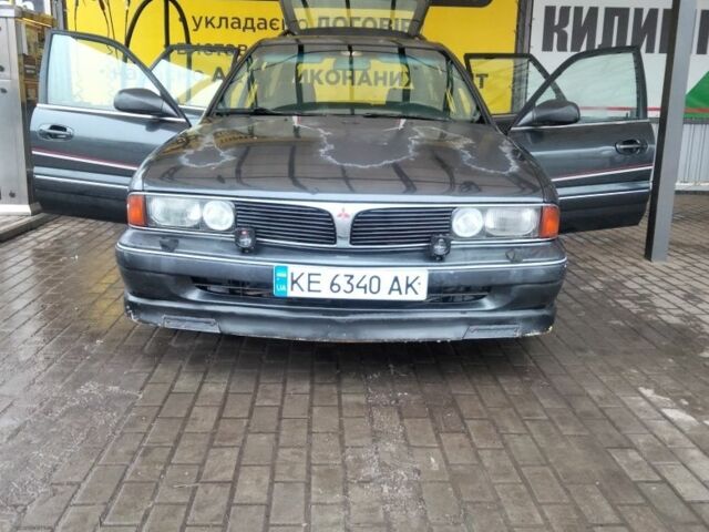 Черный Мицубиси Сигма, объемом двигателя 3 л и пробегом 300 тыс. км за 3000 $, фото 4 на Automoto.ua