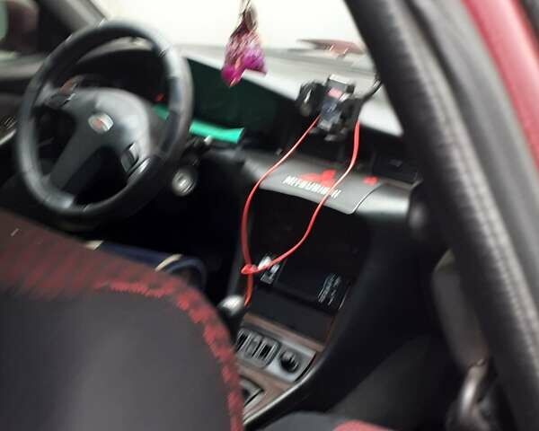 Красный Мицубиси Сигма, объемом двигателя 3 л и пробегом 100 тыс. км за 2000 $, фото 3 на Automoto.ua