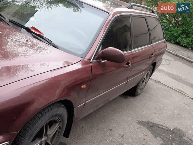 Красный Мицубиси Сигма, объемом двигателя 3 л и пробегом 100 тыс. км за 2000 $, фото 5 на Automoto.ua