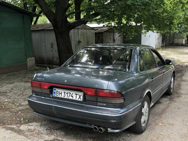 Серый Мицубиси Сигма, объемом двигателя 3 л и пробегом 300 тыс. км за 1500 $, фото 2 на Automoto.ua