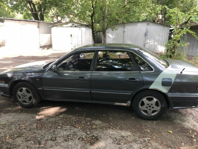 Серый Мицубиси Сигма, объемом двигателя 3 л и пробегом 300 тыс. км за 1500 $, фото 4 на Automoto.ua