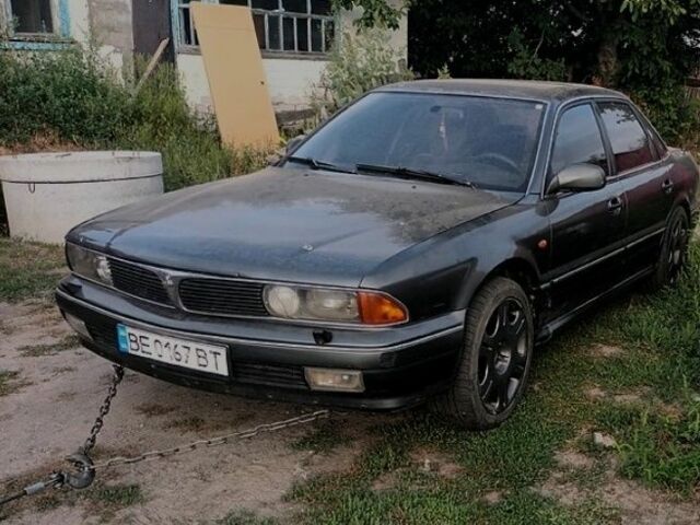 Серый Мицубиси Сигма, объемом двигателя 3 л и пробегом 370 тыс. км за 1546 $, фото 2 на Automoto.ua