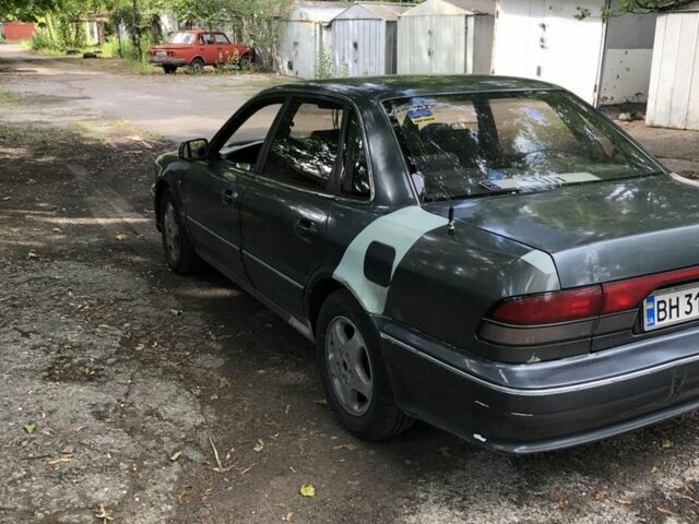 Серый Мицубиси Сигма, объемом двигателя 3 л и пробегом 300 тыс. км за 1500 $, фото 3 на Automoto.ua