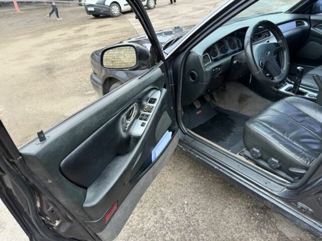 Серый Мицубиси Сигма, объемом двигателя 3 л и пробегом 185 тыс. км за 1550 $, фото 4 на Automoto.ua