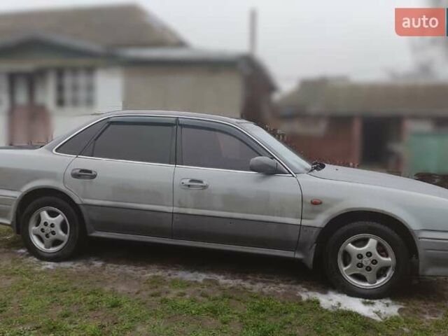 Серый Мицубиси Сигма, объемом двигателя 3 л и пробегом 366 тыс. км за 1700 $, фото 2 на Automoto.ua