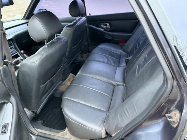 Серый Мицубиси Сигма, объемом двигателя 3 л и пробегом 185 тыс. км за 1550 $, фото 7 на Automoto.ua