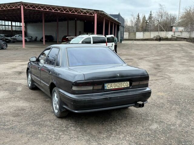 Серый Мицубиси Сигма, объемом двигателя 3 л и пробегом 185 тыс. км за 1550 $, фото 2 на Automoto.ua