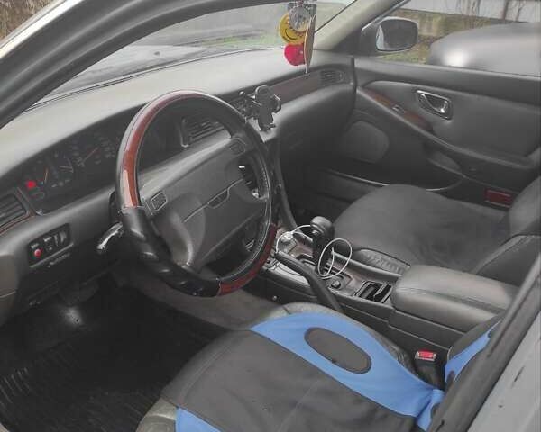 Серый Мицубиси Сигма, объемом двигателя 3 л и пробегом 366 тыс. км за 1700 $, фото 14 на Automoto.ua