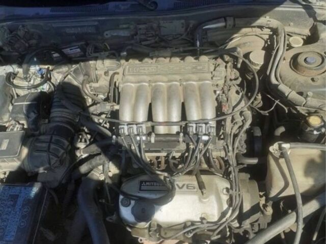 Серый Мицубиси Сигма, объемом двигателя 3 л и пробегом 300 тыс. км за 1500 $, фото 4 на Automoto.ua