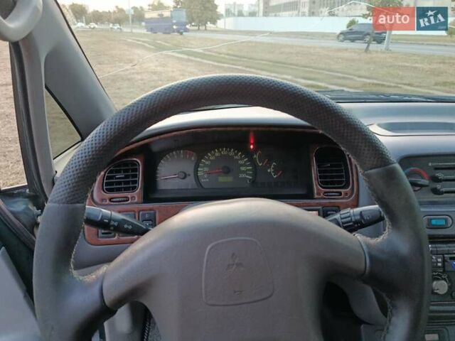 Зеленый Мицубиси Спейс Гир, объемом двигателя 2 л и пробегом 440 тыс. км за 3800 $, фото 15 на Automoto.ua