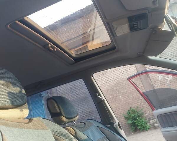 Червоний Міцубісі Спейс Раннер, об'ємом двигуна 1.83 л та пробігом 200 тис. км за 1500 $, фото 1 на Automoto.ua
