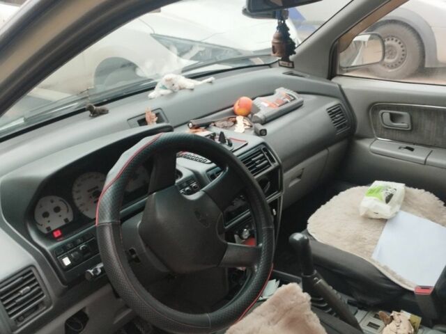 Серый Мицубиси Спейс Раннер, объемом двигателя 2 л и пробегом 56 тыс. км за 1424 $, фото 2 на Automoto.ua