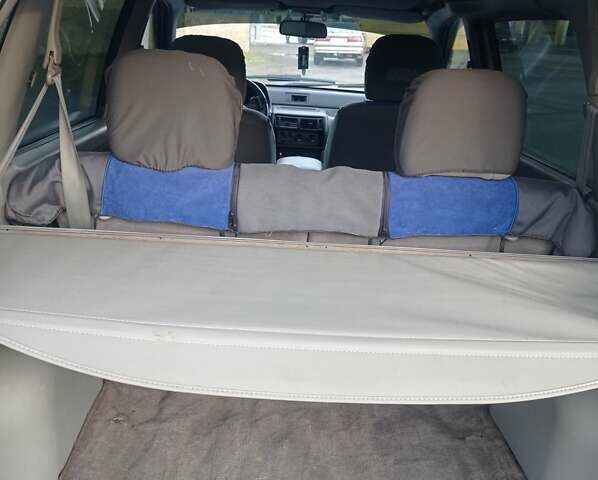 Синій Міцубісі Спейс Раннер, об'ємом двигуна 1.8 л та пробігом 390 тис. км за 2700 $, фото 11 на Automoto.ua