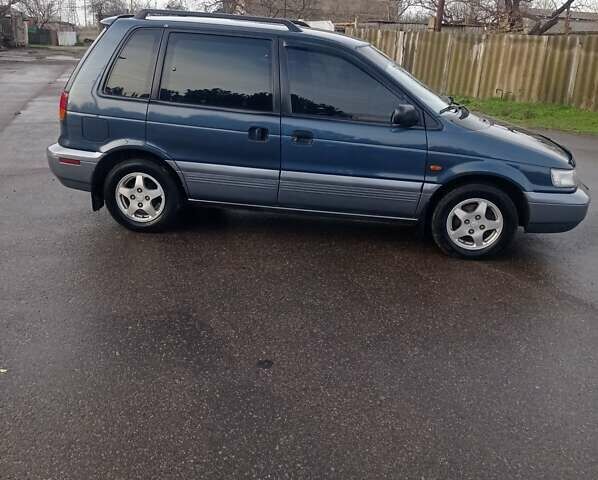 Синій Міцубісі Спейс Раннер, об'ємом двигуна 1.8 л та пробігом 390 тис. км за 2700 $, фото 2 на Automoto.ua