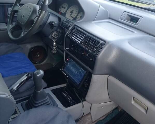 Синій Міцубісі Спейс Раннер, об'ємом двигуна 1.8 л та пробігом 390 тис. км за 2700 $, фото 7 на Automoto.ua